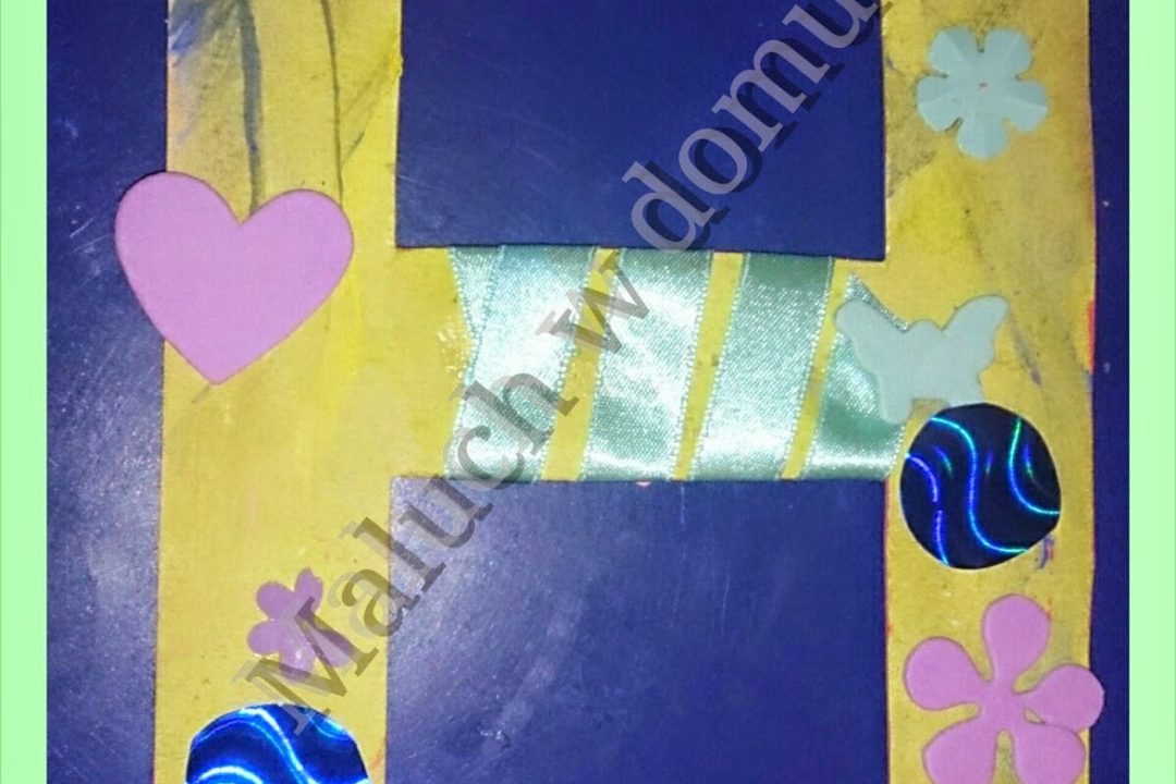 Dwustronnie zdobiona literka